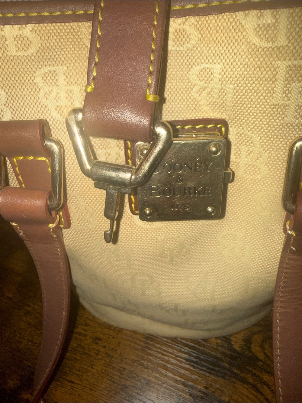 Dooney and Bourke Beige Canvas Bucket Tote with Brown Leather Trim - Picture 7 of 8